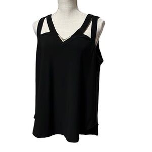 Endes black top with unique straps. Size lg